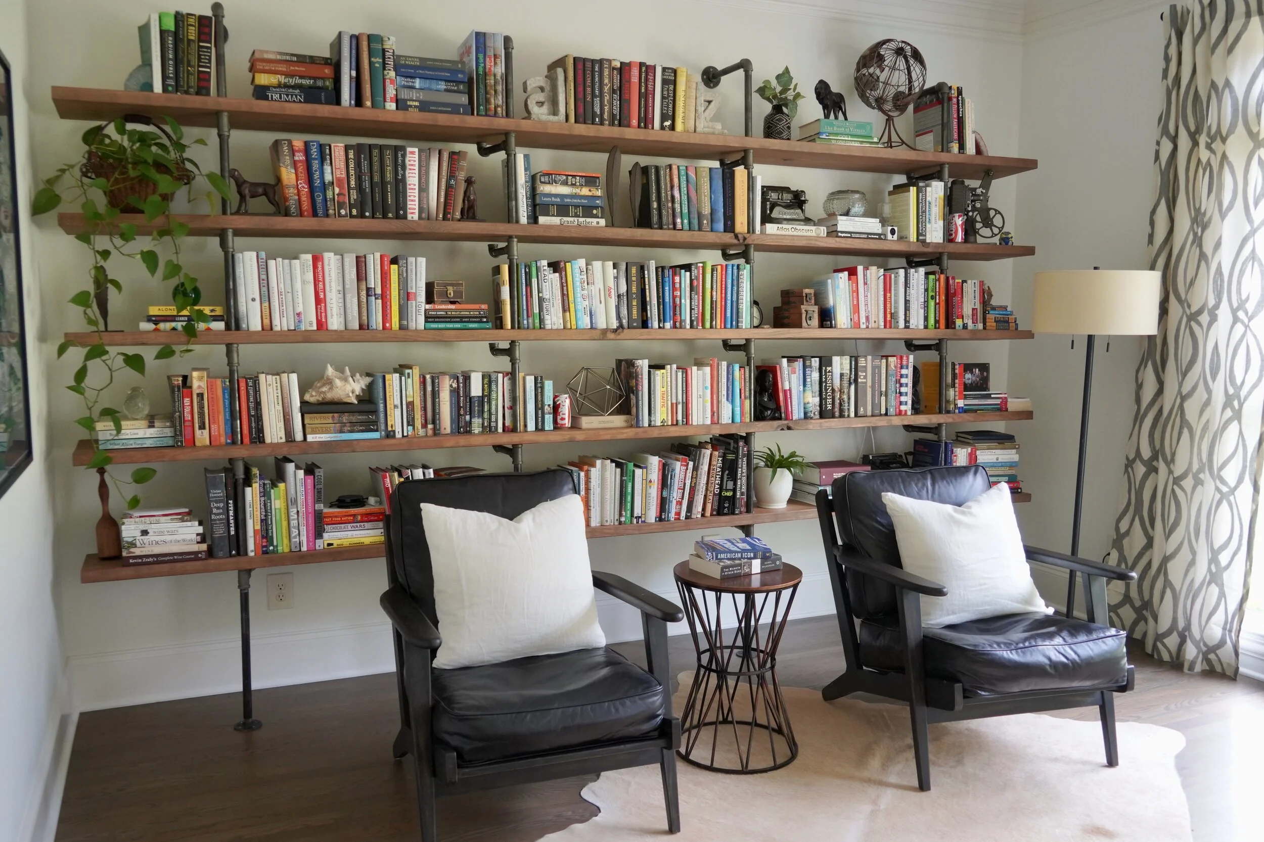 Home library styled with curated objects